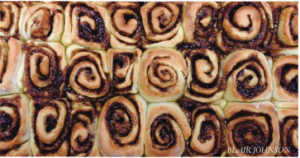 Students bake delicious cinnamon rolls at Baking Club.