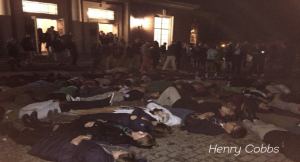 Students partake in a die-in after Sunday sit-down. Credit: Henry Cobbs