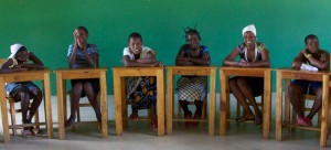 The girls of JBFC enjoy themselves in a classroom setting.